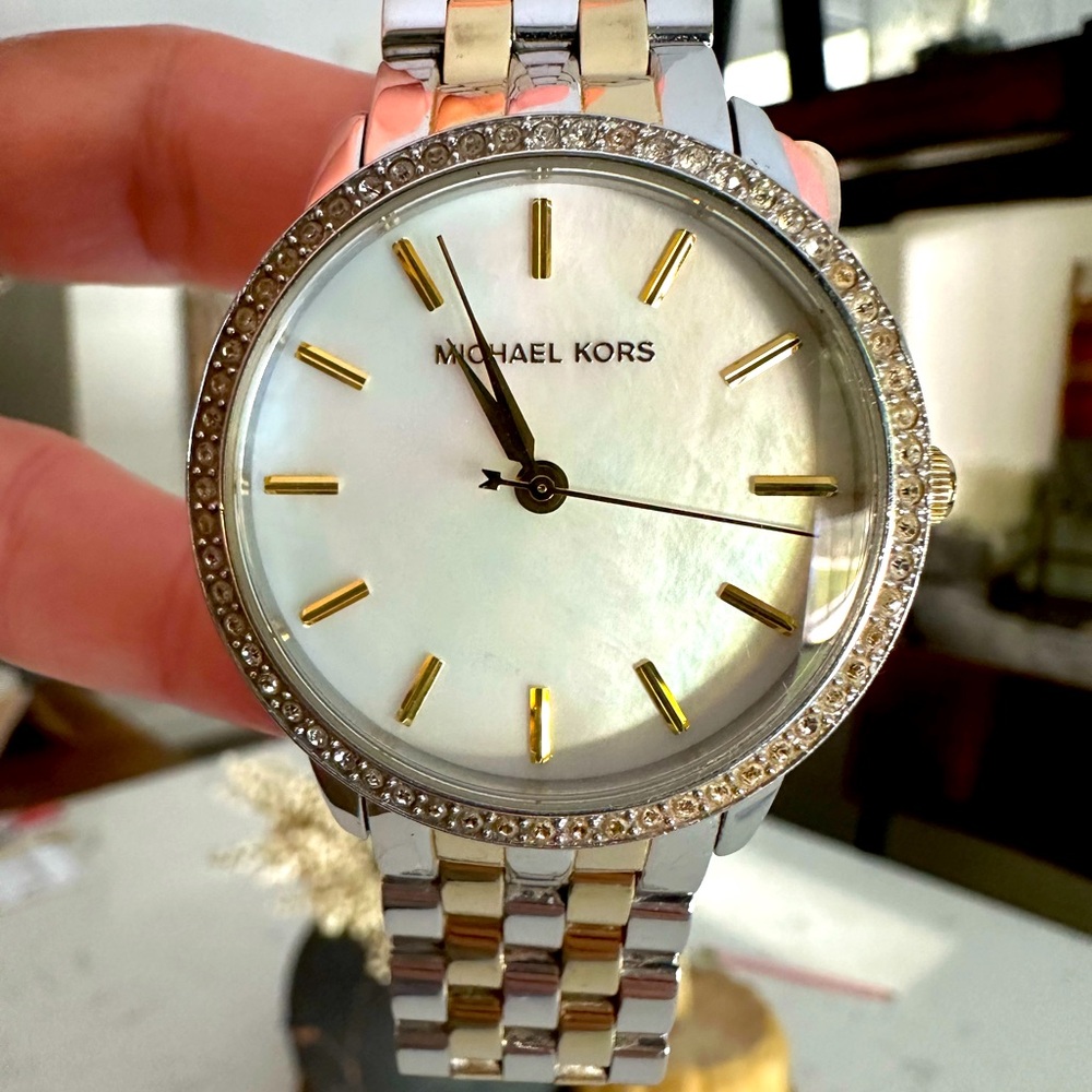 Two tone women’s Michael Kors watch
